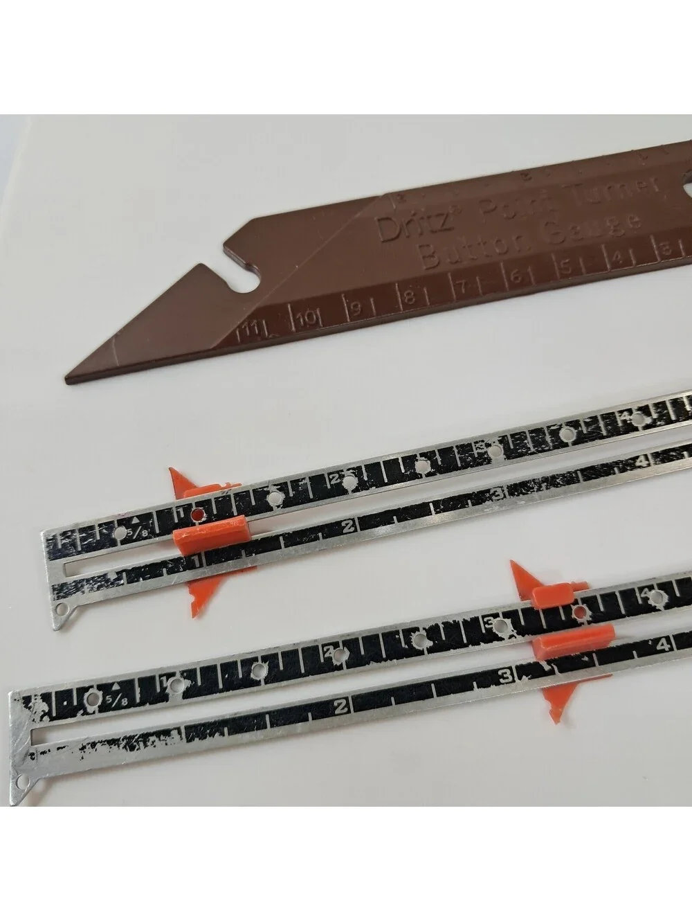 Vintage Dritz All Metal Measuring Sewing Gauge slide ruler & button gauge brown
